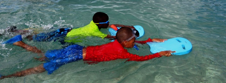 Students work to hone their swimming skills. 